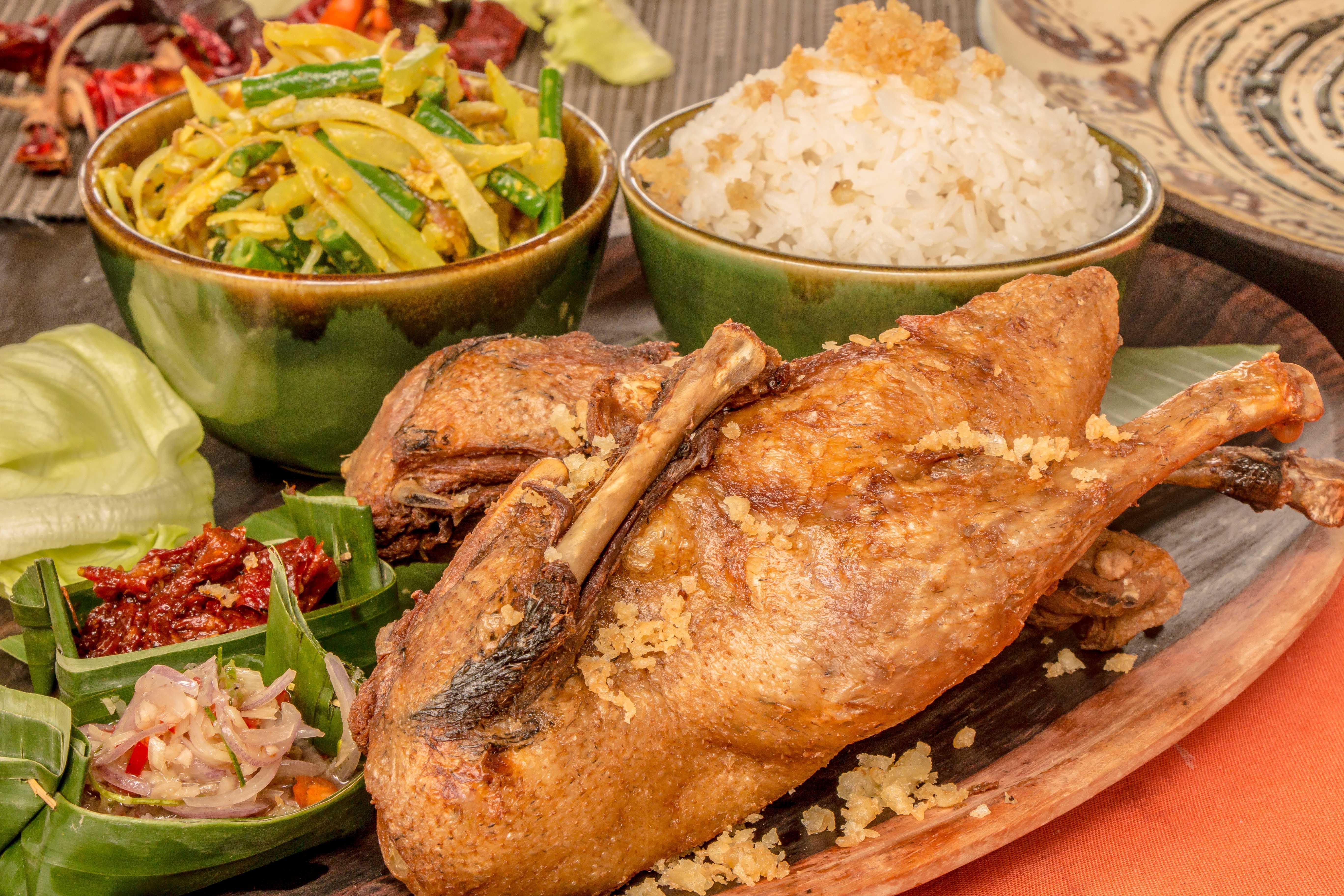 Montigo Resorts Seminyak Εξωτερικό φωτογραφία Fried fish with rice